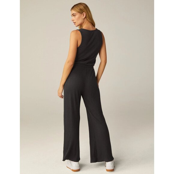 Beyond Yoga Black Ribbed Jetsetter Jumpsuit Sleeveless V-Neck Drawstring Waist - Picture 6 of 10